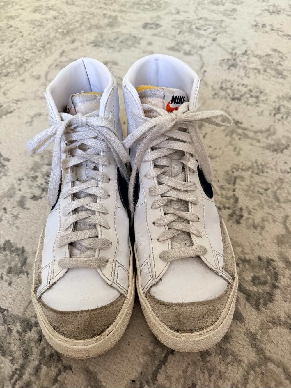 Nike White Sneakers with Black Swoosh and Suede Accents